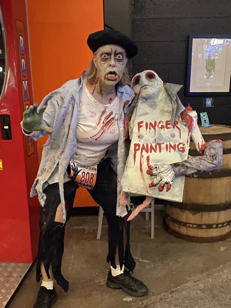 2021 Zombie Run Best female contest winner. Finger painting prop with movable arm, acrylic and discarded items