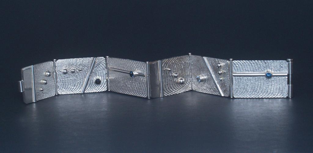 Hinged silver cuttlebone cast panel bracelet