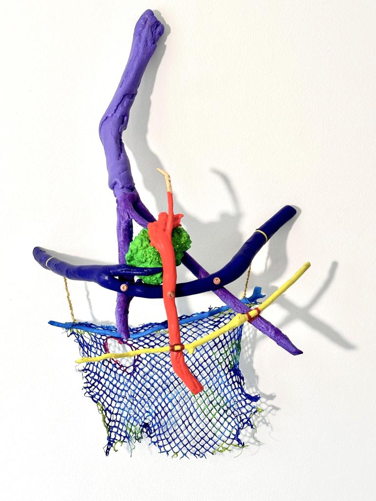 25"h x 14"w x8"d, mixed-media wall mounted polychrome sculpture, 2025, $850
