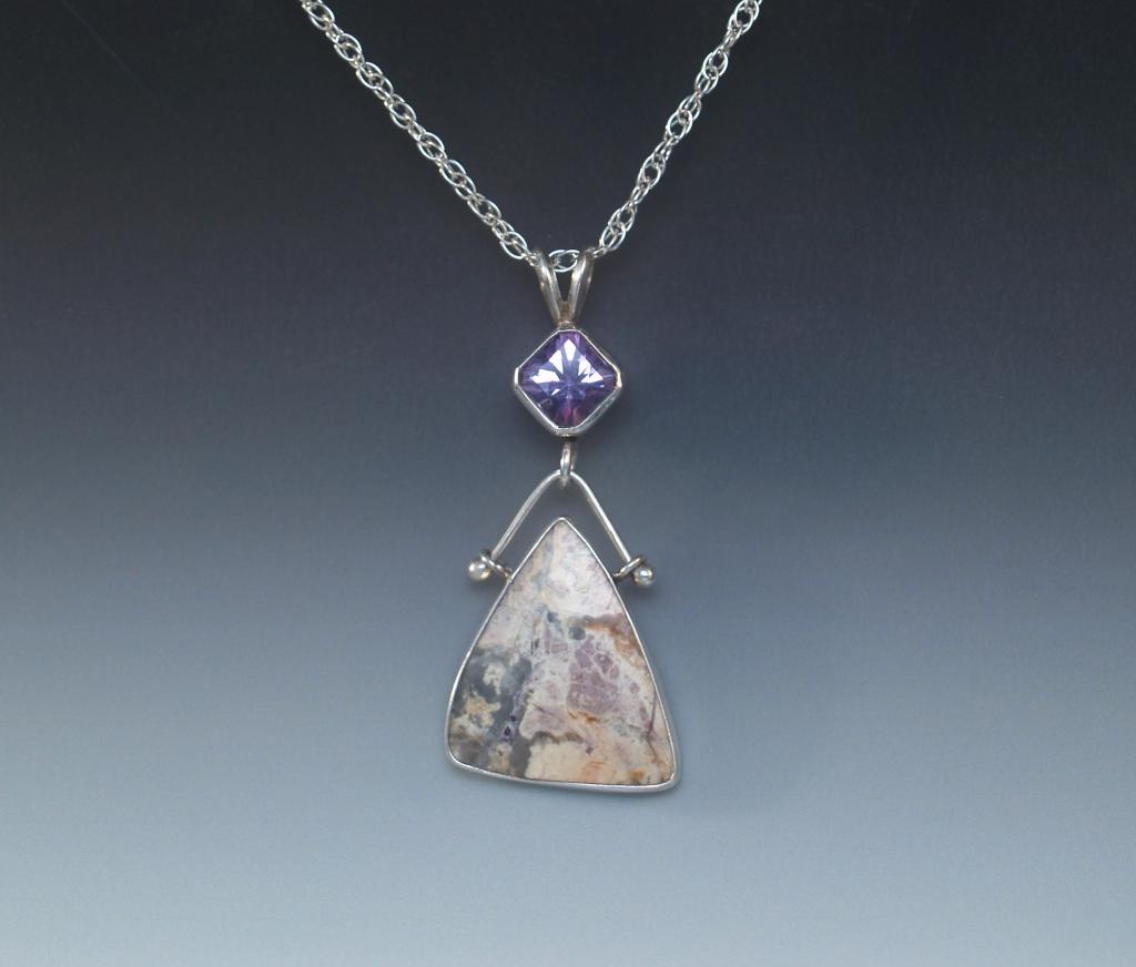 Silver pendant with Tiffany stone cabochon & amethyst