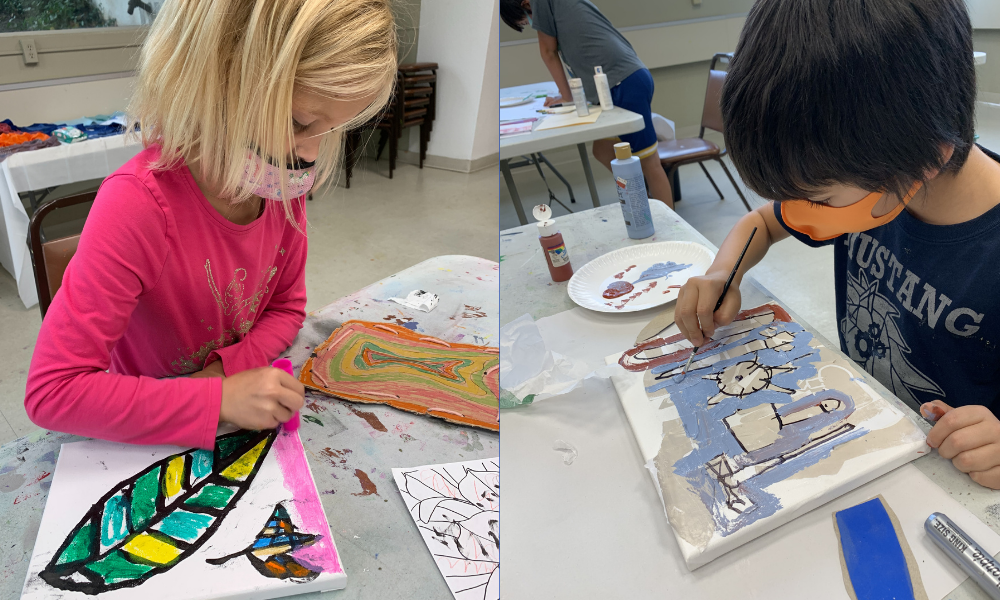 kids creating on canvas